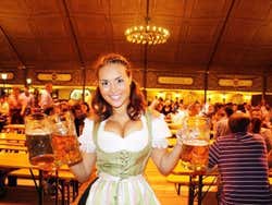 Traditional dirndl-wearing waitress at Oktoberfest